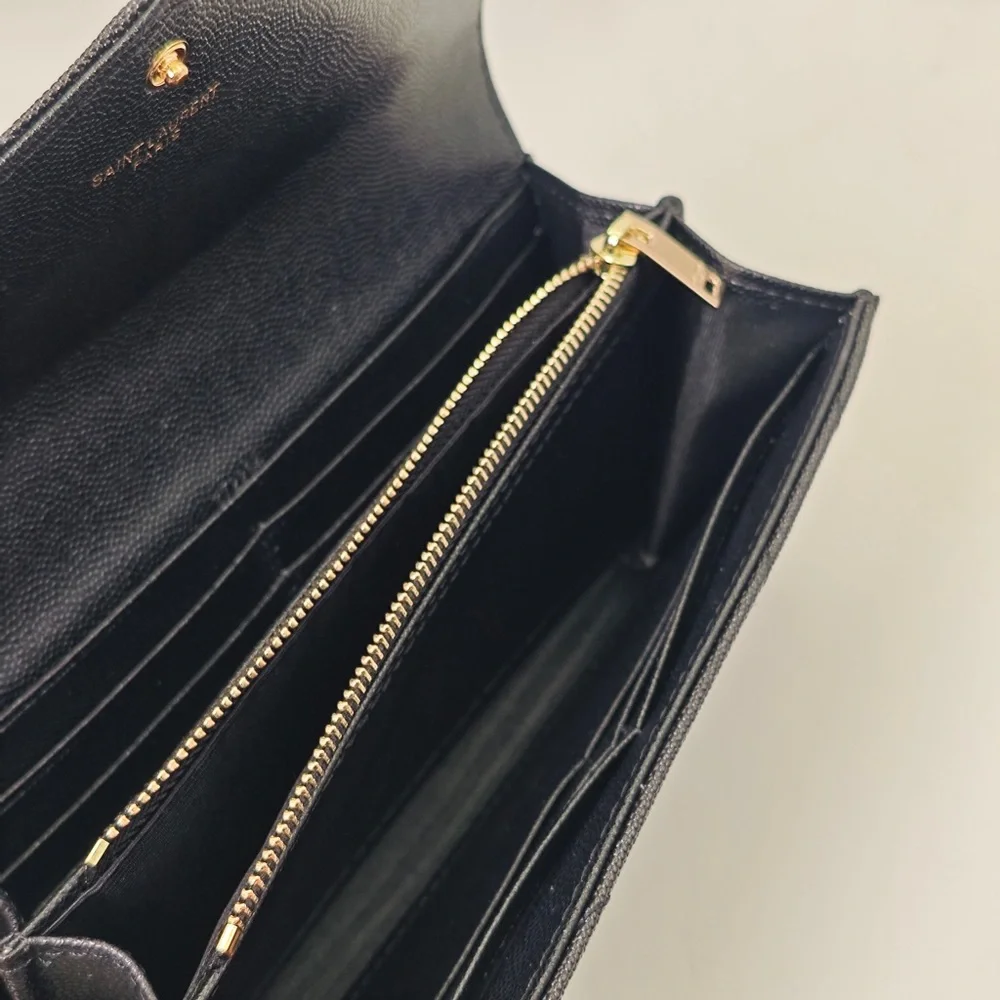 Yves Saint Laurent Quilted Black Clutch with Gold Accent